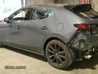 2021 Mazda 3 Premium Plus with VIN JM1BPBNYXM1311594, listed as a Copart auction lot 61470625 with 89,254 mi miles and Salvage title. Bid and sale history available at DreamBid. Image 2.