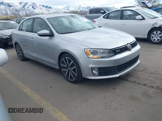 2014 Volkswagen Jetta GLI Edition 30 z VIN 3VW4S7AJ2EM214517, wystawiony jako IAAI lot #41662860 z przebiegiem 185 783 mil mil oraz . Historia ofert i sprzedaży dostępna na DreamBid. Obrazek 1.