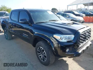 2023 Toyota Tacoma 4WD SR with VIN 3TYCZ5AN0PT162457, listed as a IAAI auction lot 41955808 with 26,524 mi miles. Bid and sale history available at carsss.com. Image 1.