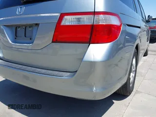 2006 Honda Odyssey EX-L z VIN 5FNRL38716B051664, wystawiony jako IAAI lot #42520320 z przebiegiem 304 835 mil mil oraz . Historia ofert i sprzedaży dostępna na DreamBid. Obrazek 6.