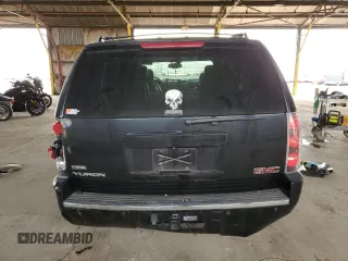 2009 GMC Yukon Denali z VIN 1GKFK03269R144974, wystawiony jako Copart lot #49354815 z przebiegiem 141 569 mil mil oraz Szkoda całkowita • Salvage title. Historia ofert i sprzedaży dostępna na DreamBid. Obrazek 6.