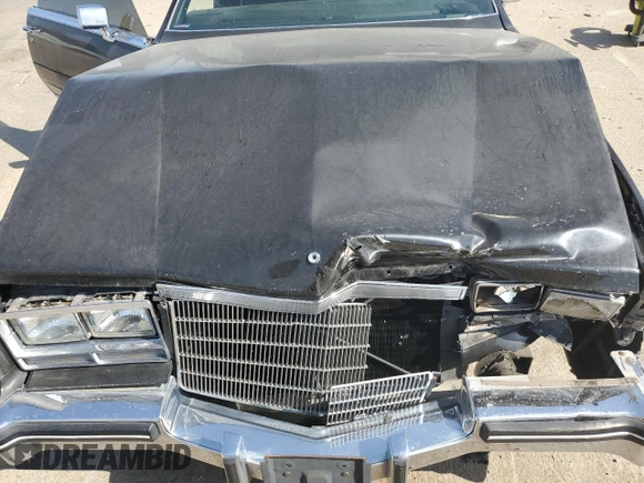 1985 Cadillac Eldorado z VIN 1G6EL5780FE622179, wystawiony jako Copart lot #54109205 z przebiegiem 73 403 mil mil oraz Szkoda całkowita • Salvage title. Historia ofert i sprzedaży dostępna na DreamBid. Obrazek 11.