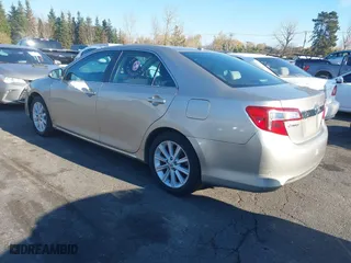 2014 Toyota Camry Hybrid LE with VIN 4T1BD1FK8EU097505, listed as a IAAI auction lot 38159878 with 379,573 mi miles. Bid and sale history available at carsss.com. Image 3.