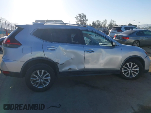 2019 Nissan Rogue SV with VIN JN8AT2MT9KW263622, listed as a IAAI auction lot 42021454 with 60,825 mi miles. Bid and sale history available at carsss.com. Image 13.