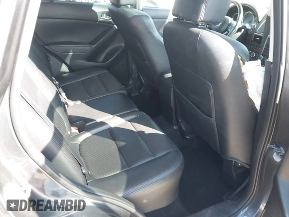2014 Mazda CX-5 Grand Touring with VIN JM3KE4DY4E0320695, listed as a IAAI auction lot 41989350 with 169,391 mi miles and . Bid and sale history available at DreamBid. Image 8.