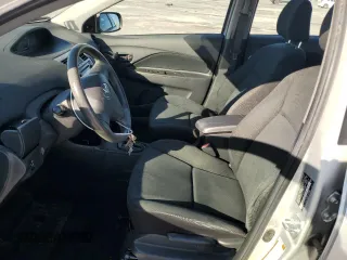 2009 Toyota Yaris with VIN JTDBT903891347503, listed as a Copart auction lot 52719375 with 134,931 mi miles and Salvage Title. Bid and sale history available at carsss.com. Image 7.