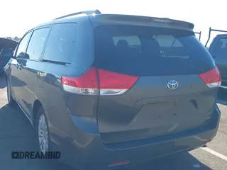 2011 Toyota Sienna XLE AAS with VIN 5TDYK3DC4BS072693, listed as a IAAI auction lot 41579262 with 146,201 mi miles. Bid and sale history available at carsss.com. Image 3.