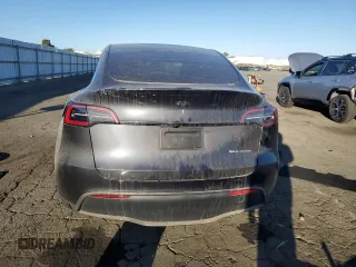 2024 Tesla Model Y Long Range с VIN 7SAYGDEE3RF008119, выставлен на аукционе Copart как лот 76385264 с пробегом 2 918 миль миль и Списание • Salvage title. История ставок и продаж доступна на DreamBid. Изображение 6.