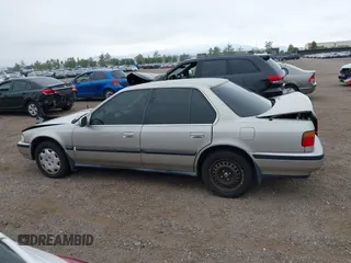 1991 Honda Accord LX z VIN JHMCB7655MC000372, wystawiony jako IAAI lot #42372597 z przebiegiem 153 129 mil mil oraz . Historia ofert i sprzedaży dostępna na DreamBid. Obrazek 14.