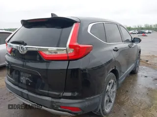 2017 Honda CR-V EX with VIN 7FARW1H59HE007171, listed as a IAAI auction lot 42033941 with 134,227 mi miles and . Bid and sale history available at carsss.com. Image 4.