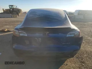 2018 Tesla Model 3 Long Range Battery with VIN 5YJ3E1EB9JF075202, listed as a Copart auction lot 87616115 with 76,881 mi miles and Salvage Title. Bid and sale history available at DreamBid. Image 6.