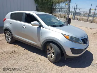 2012 Kia Sportage LX with VIN KNDPB3A27C7326884, listed as a IAAI auction lot 42010016 with 112,797 mi miles. Bid and sale history available at carsss.com. Image 1.