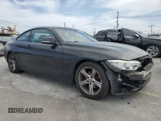 2014 BMW 4 Series 428i with VIN WBA3N7C55EF719986, listed as a Copart auction lot 56692685 with 74,377 mi miles and Salvage title. Bid and sale history available at DreamBid. Image 4.