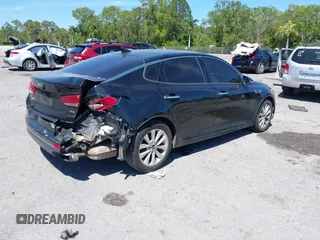 2017 Kia Optima EX with VIN 5XXGU4L35HG142807, listed as a IAAI auction lot 41856251 with 104,634 mi miles and . Bid and sale history available at carsss.com. Image 4.