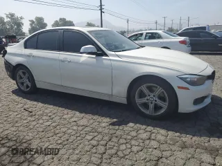 2015 BMW 3 Series 328i with VIN WBA3C1C51FP852887, listed as a Copart auction lot 58882695 with 146,823 mi miles and Salvage title. Bid and sale history available at DreamBid. Image 4.