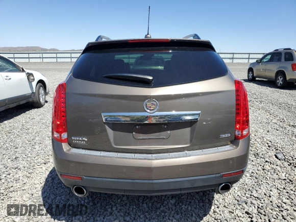 2015 Cadillac SRX Luxury Collection z VIN 3GYFNBE35FS555046, wystawiony jako Copart lot #57589155 z przebiegiem 108 456 mil mil oraz Szkoda całkowita • Salvage title. Historia ofert i sprzedaży dostępna na DreamBid. Obrazek 6.