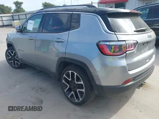 2018 Jeep Compass Limited with VIN 3C4NJCCBXJT499864, listed as a IAAI auction lot 42319832 with 94,893 mi miles and . Bid and sale history available at DreamBid. Image 3.