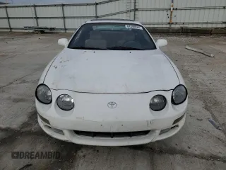 1998 Toyota Celica GT with VIN JT2DG02T9W0051731, listed as a Copart auction lot 84390884 with 234,279 mi miles and Salvage Title. Bid and sale history available at carsss.com. Image 5.