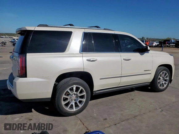 2015 GMC Yukon Denali z VIN 1GKS2CKJ6FR706151, wystawiony jako Copart lot #50556805 z przebiegiem 174 259 mil mil oraz Czysty tytuł • Clean title. Historia ofert i sprzedaży dostępna na DreamBid. Obrazek 3.