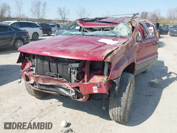 2004 Jeep Grand Cherokee Laredo z VIN 1J4GW48S34C289321, wystawiony jako IAAI lot #42062819 z przebiegiem Nie podano mil oraz . Historia ofert i sprzedaży dostępna na DreamBid. Obrazek 6.