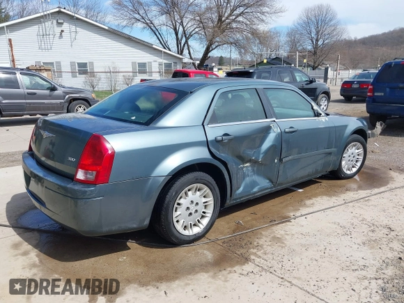 2005 Chrysler 300 with VIN 2C3JA43R45H616682, listed as a IAAI auction lot 41853835 with 158,464 mi miles. Bid and sale history available at carsss.com. Image 4.