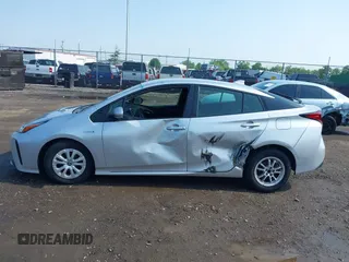 2022 Toyota Prius L Eco z VIN JTDKAMFU2N3165805, wystawiony jako IAAI lot #42428676 z przebiegiem 435 471 mil mil oraz . Historia ofert i sprzedaży dostępna na DreamBid. Obrazek 14.