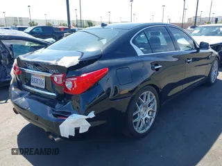 2014 Infiniti Q50 Hybrid Sport with VIN JN1AV7AR8EM700220, listed as a IAAI auction lot 41755814 with 133,154 mi miles. Bid and sale history available at carsss.com. Image 4.