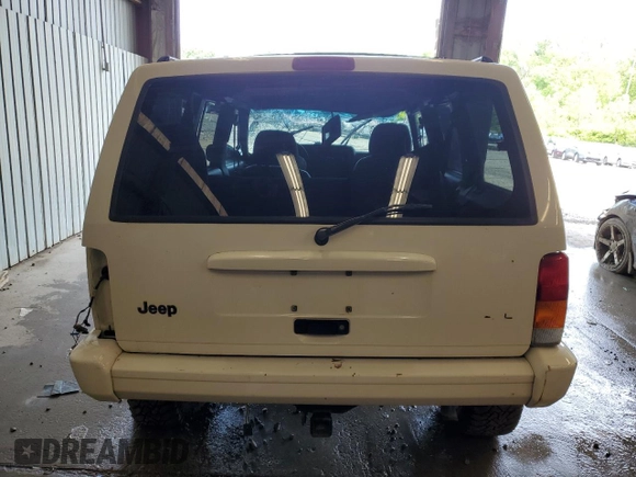 1998 Jeep Cherokee Sport с VIN 1J4FJ68S7WL264740, выставлен на аукционе Copart как лот 59078465 с пробегом 147 318 миль миль и Списание • Salvage title. История ставок и продаж доступна на DreamBid. Изображение 6.