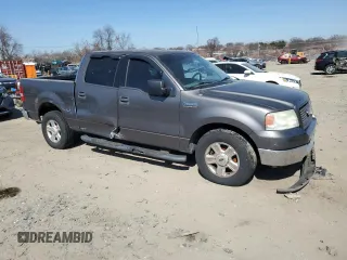 2004 Ford F-150 XLT with VIN 1FTRW12W14FA12948, listed as a Copart auction lot 48560795 with 266,969 mi miles and Salvage Title. Bid and sale history available at carsss.com. Image 4.
