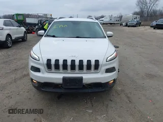 2015 Jeep Cherokee North with VIN 1C4PJMCS6FW564435, listed as a IAAI auction lot 41992440 with 166,048 mi miles. Bid and sale history available at carsss.com. Image 12.