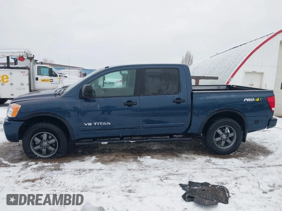 2015 Nissan Titan SV z VIN 1N6AA0ECXFN507260, wystawiony jako IAAI lot #41203612 z przebiegiem 103 000 mil mil oraz . Historia ofert i sprzedaży dostępna na DreamBid. Obrazek 14.