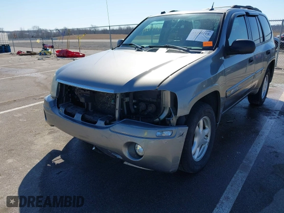 2005 GMC Envoy SLE z VIN 1GKDT13S252331044, wystawiony jako IAAI lot #41749219 z przebiegiem 263 876 mil mil oraz . Historia ofert i sprzedaży dostępna na DreamBid. Obrazek 6.
