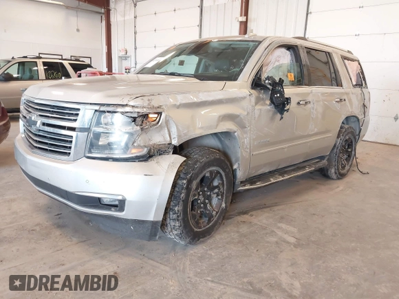 2016 Chevrolet Tahoe LTZ with VIN 1GNSKCKCXGR477284, listed as a IAAI auction lot 42221589 with Not provided miles and . Bid and sale history available at DreamBid. Image 2.