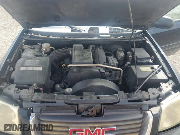 2004 GMC Envoy SLE with VIN 1GKDS13S942114009, listed as a Copart auction lot 67276454 with 178,107 mi miles and Salvage Title. Bid and sale history available at DreamBid. Image 12.
