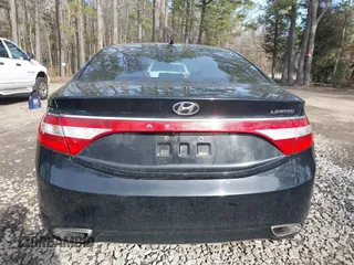 2014 Hyundai Azera Limited with VIN KMHFH4JG0EA368973, listed as a IAAI auction lot 41656545 with 108,631 mi miles and . Bid and sale history available at carsss.com. Image 16.