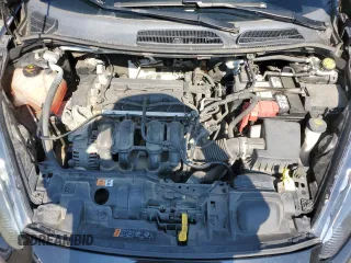 2015 Ford Fiesta S z VIN 3FADP4AJ4FM160907, wystawiony jako Copart lot #63434595 z przebiegiem 109 231 mil mil oraz Szkoda całkowita • Salvage title. Historia ofert i sprzedaży dostępna na DreamBid. Obrazek 11.