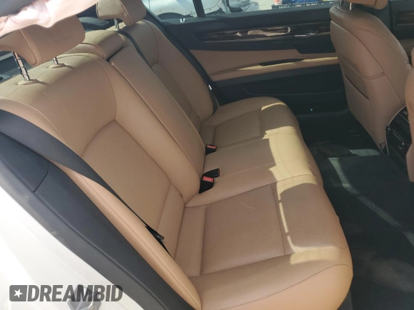 2015 BMW 7 Series 740Li with VIN WBAYE4C50FD138994, listed as a Copart auction lot 73342663 with 102,711 mi miles and . Bid and sale history available at DreamBid. Image 10.