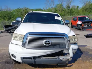 2012 Toyota Tundra 4WD Truck LTD with VIN 5TFHW5F1XCX269682, listed as a IAAI auction lot 41968019 with 166,074 mi miles. Bid and sale history available at carsss.com. Image 13.
