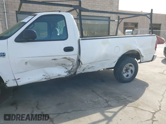 2000 Ford F-150 XL with VIN 1FTRF17WXYKA72880, listed as a IAAI auction lot 41989317 with 149,967 mi miles. Bid and sale history available at carsss.com. Image 6.
