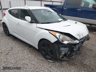 2014 Hyundai Veloster with VIN KMHTC6AD7EU217470, listed as a IAAI auction lot 41286296 with 150,034 mi miles. Bid and sale history available at carsss.com. Image 1.