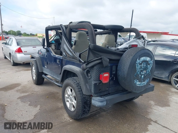 2006 Jeep Wrangler SE with VIN 1J4FA29156P739521, listed as a IAAI auction lot 42563566 with 117,281 mi miles and . Bid and sale history available at DreamBid. Image 3.