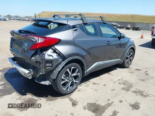2018 Toyota C-HR XLE with VIN NMTKHMBXXJR047391, listed as a IAAI auction lot 42180973 with 140,674 mi miles and . Bid and sale history available at DreamBid. Image 4.