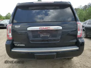 2019 GMC Yukon Denali with VIN 1GKS1CKJ0KR259491, listed as a Copart auction lot 51071335 with 105,294 mi miles and Salvage Title. Bid and sale history available at carsss.com. Image 6.