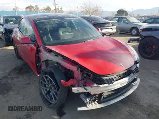 2022 Tesla Model 3 with VIN 5YJ3E1EA1NF288903, listed as a IAAI auction lot 41610215 with 96,050 mi miles and . Bid and sale history available at DreamBid. Image 1.