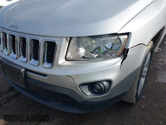 2011 Jeep Compass with VIN 1J4NT1FB4BD252724, listed as a IAAI auction lot 41247389 with 162,028 mi miles. Bid and sale history available at carsss.com. Image 6.