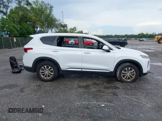 2019 Hyundai Santa Fe SE with VIN 5NMS23ADXKH038506, listed as a IAAI auction lot 42407399 with 54,540 mi miles and . Bid and sale history available at DreamBid. Image 14.