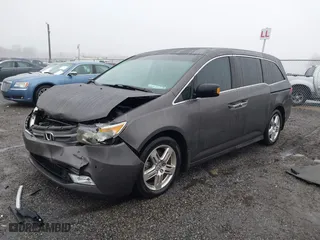 2012 Honda Odyssey Touring with VIN 5FNRL5H99CB045992, listed as a IAAI auction lot 41568183 with 133,304 mi miles. Bid and sale history available at carsss.com. Image 17.