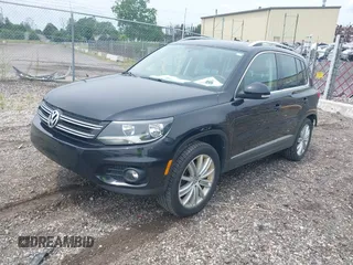 2013 Volkswagen Tiguan S with VIN WVGBV3AX7DW611410, listed as a IAAI auction lot 42549561 with 115,855 mi miles and . Bid and sale history available at DreamBid. Image 2.