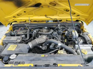 2009 Jeep Wrangler X with VIN 1J4FA241X9L765664, listed as a Copart auction lot 51802065 with 137,053 mi miles and Salvage Title. Bid and sale history available at DreamBid. Image 11.