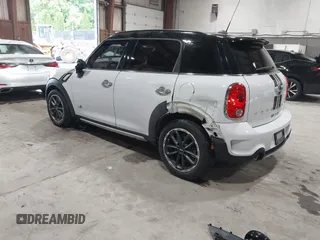 2016 MINI Countryman S with VIN WMWZC5C57GWU20085, listed as a IAAI auction lot 42403406 with 90,592 mi miles and . Bid and sale history available at DreamBid. Image 3.